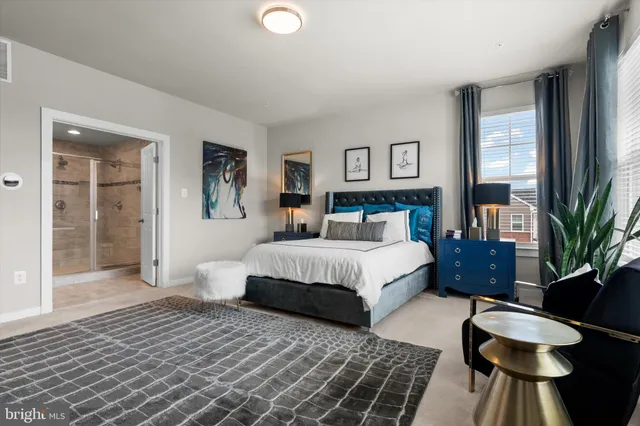 a bathroom with double sink and a mirror