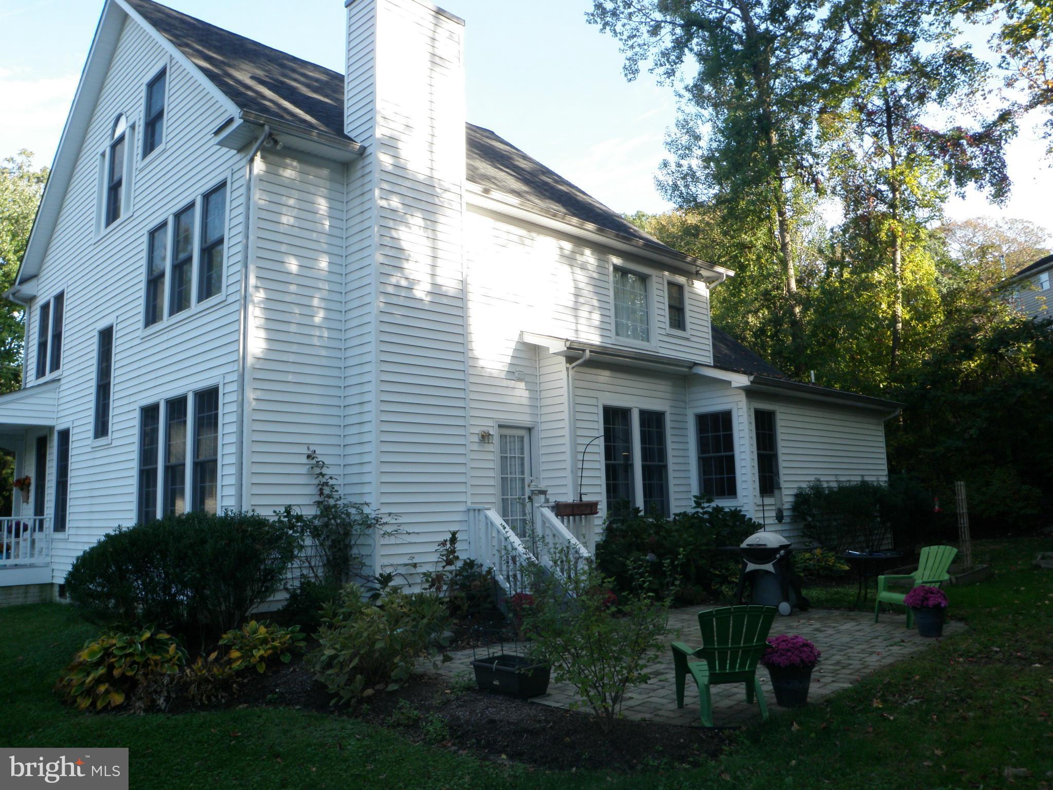 107 Shore Road Arnold, MD 21012 - Photo 4 of 30 Exterior (Rear) back to woods
