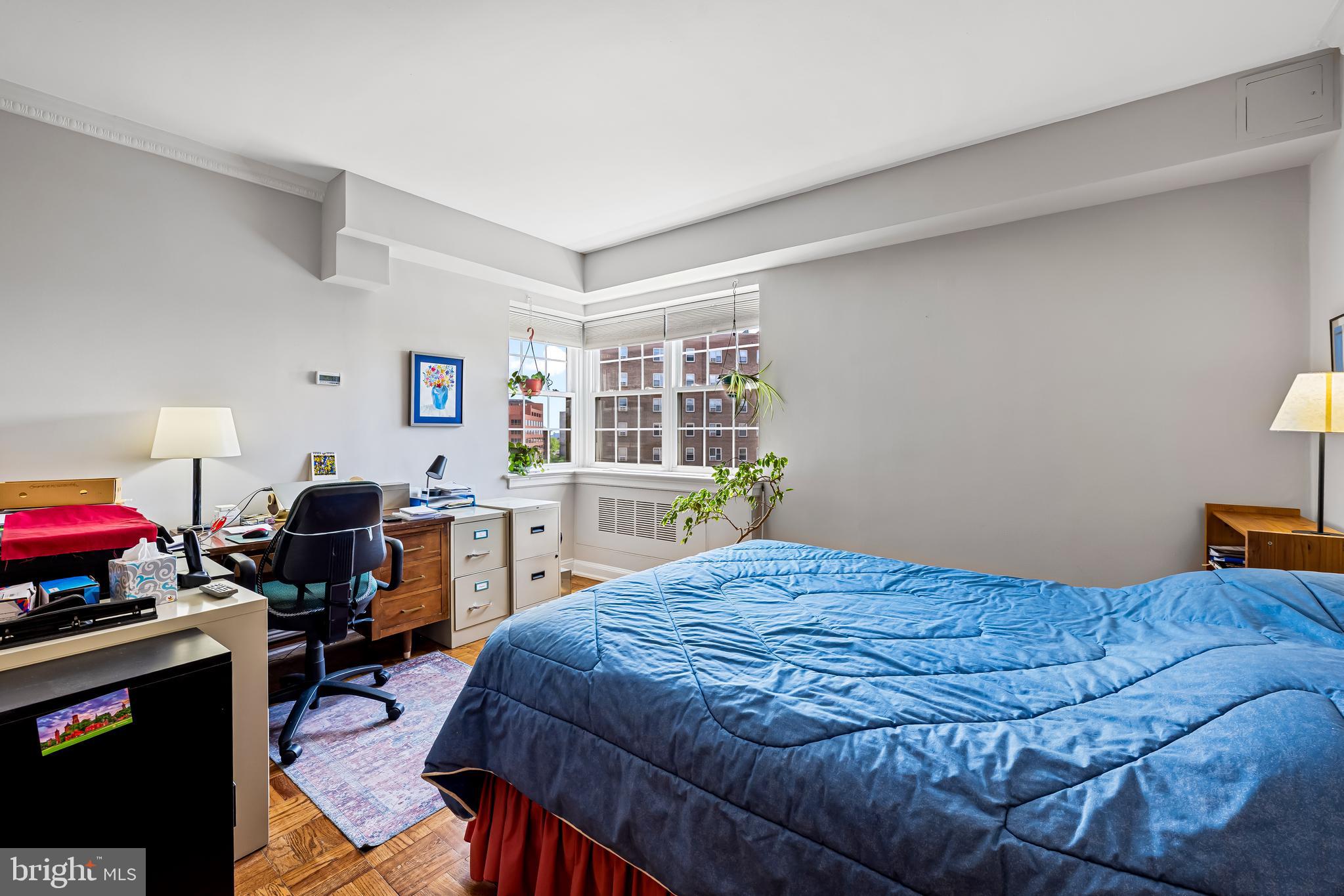 3601 Greenway, Unit 705 Baltimore, MD 21218 - Photo 19 of 30 a bed room with a bed and furniture