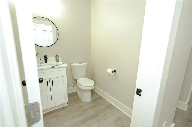 a bedroom with a bed and a ceiling fan