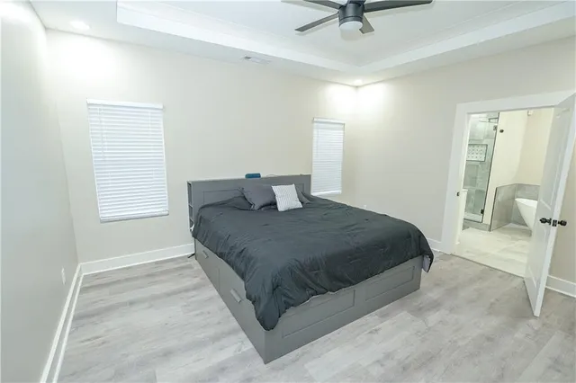 a view of a bathroom with a sink and mirror