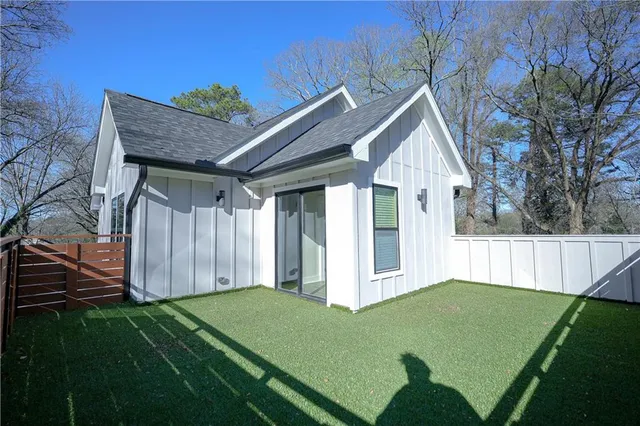 a bathroom with a sink mirror toilet and shower