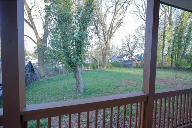 a view of backyard with green space