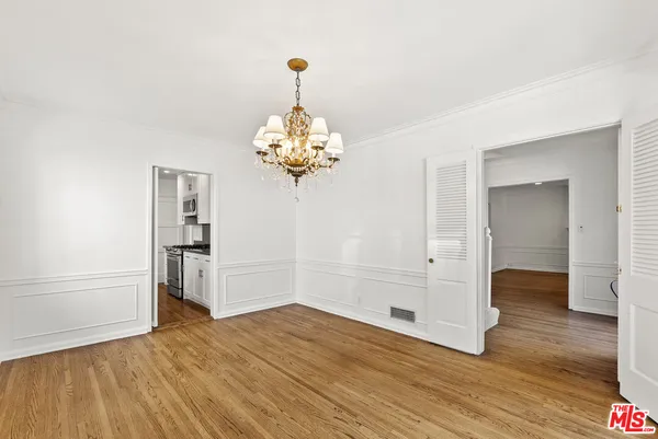 a view of livingroom with wooden floor