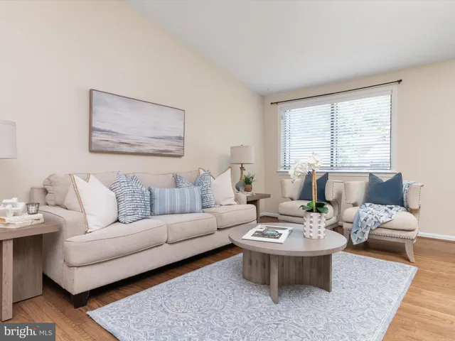 a living room with furniture and window