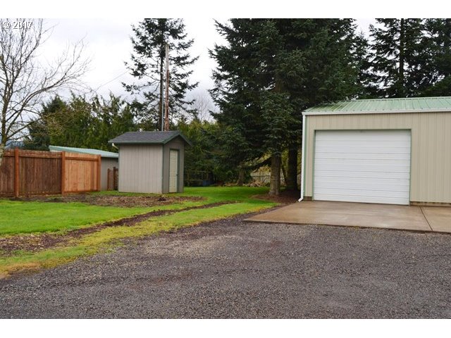 8155 Burbank Road Tillamook, OR 97141 - Photo 18 of 21 a house view with a backyard space