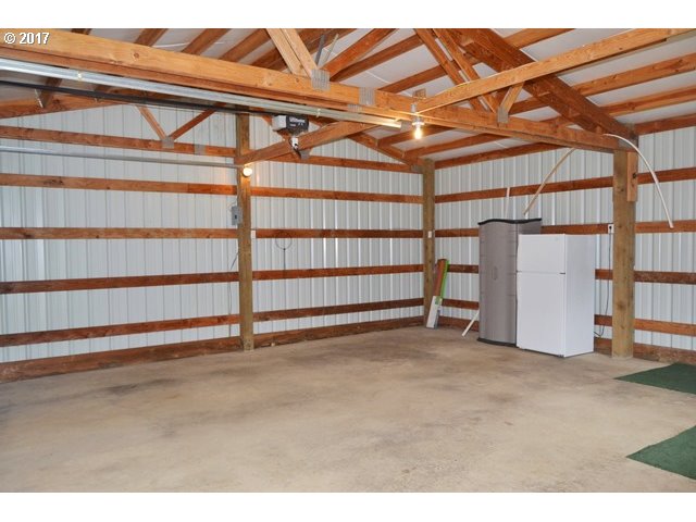 8155 Burbank Road Tillamook, OR 97141 - Photo 21 of 21 a view of a room with racks on the wall