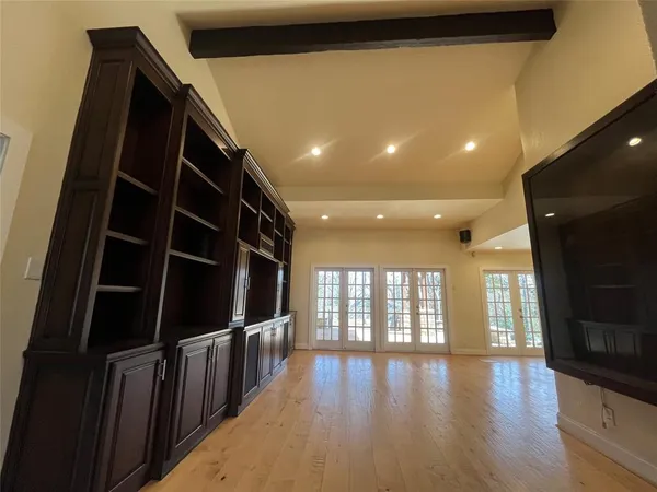 a kitchen with granite countertop stainless steel appliances and wooden cabinets