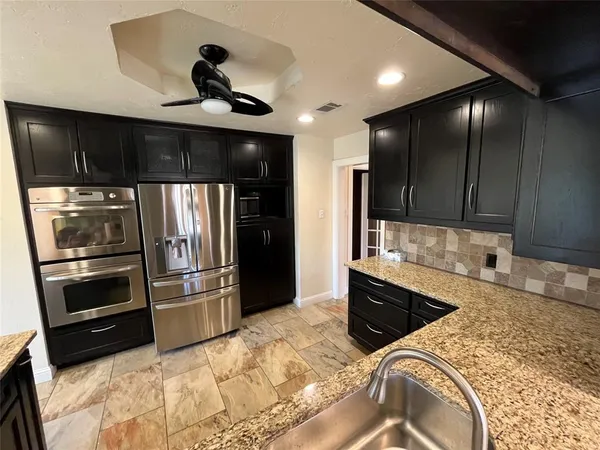 a view of an entryway of a house with a window