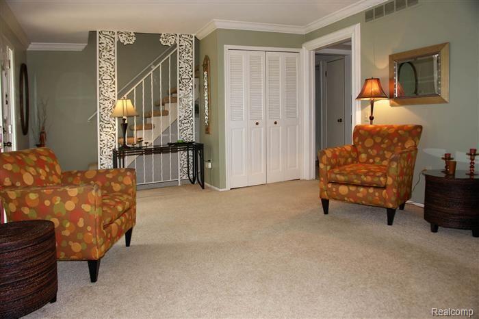 11703 Sycamore Road, Unit 4 Plymouth, MI 48170 - Photo 10 of 14 livingroom1_700