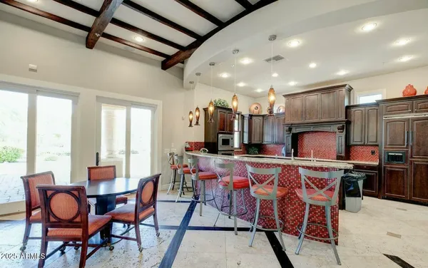 a view of a dining room with furniture