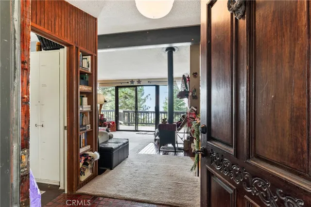 a view of a livingroom with furniture and windows