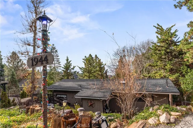 a view of backyard with a tub and trees