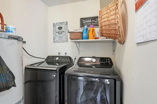 a utility room with dryer and washer