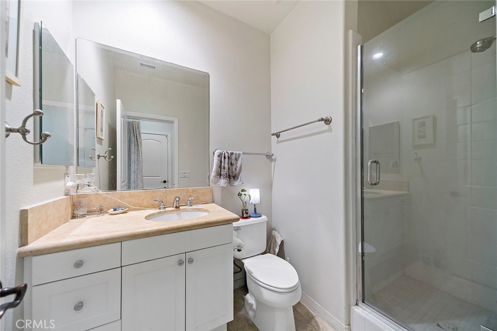 876 Sunset Place Diamond Bar, CA 91765 - Photo 12 of 17 a bathroom with a sink toilet and shower