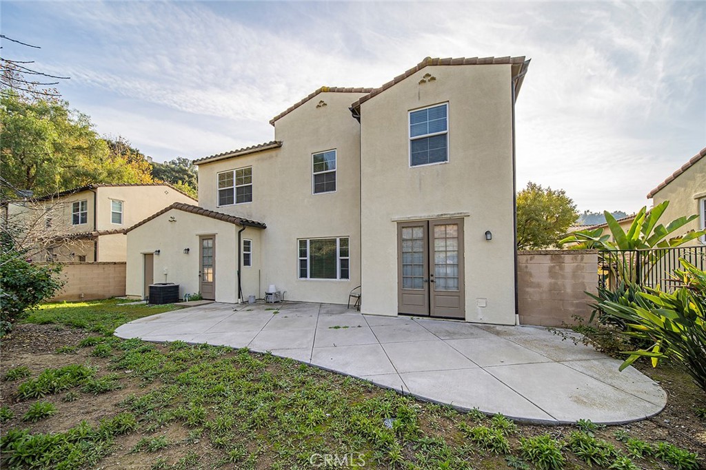 876 Sunset Place Diamond Bar, CA 91765 - Photo 13 of 17 a front view of a house with a garden