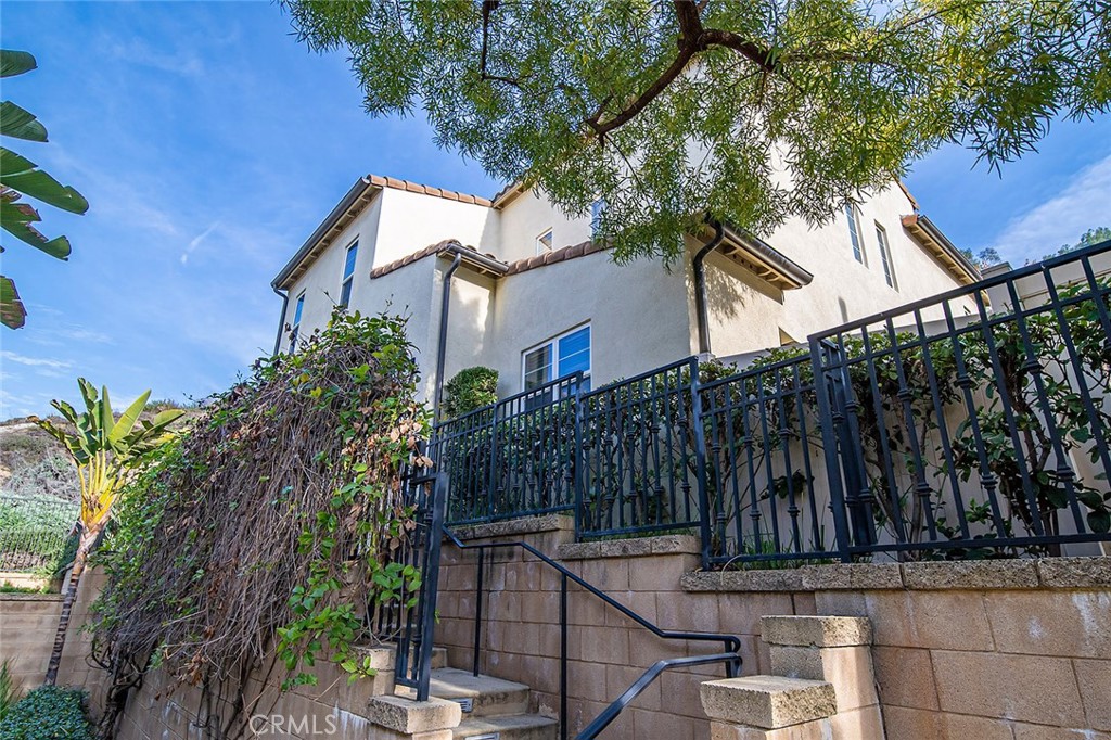 876 Sunset Place Diamond Bar, CA 91765 - Photo 4 of 17 a view of a house with wooden fence