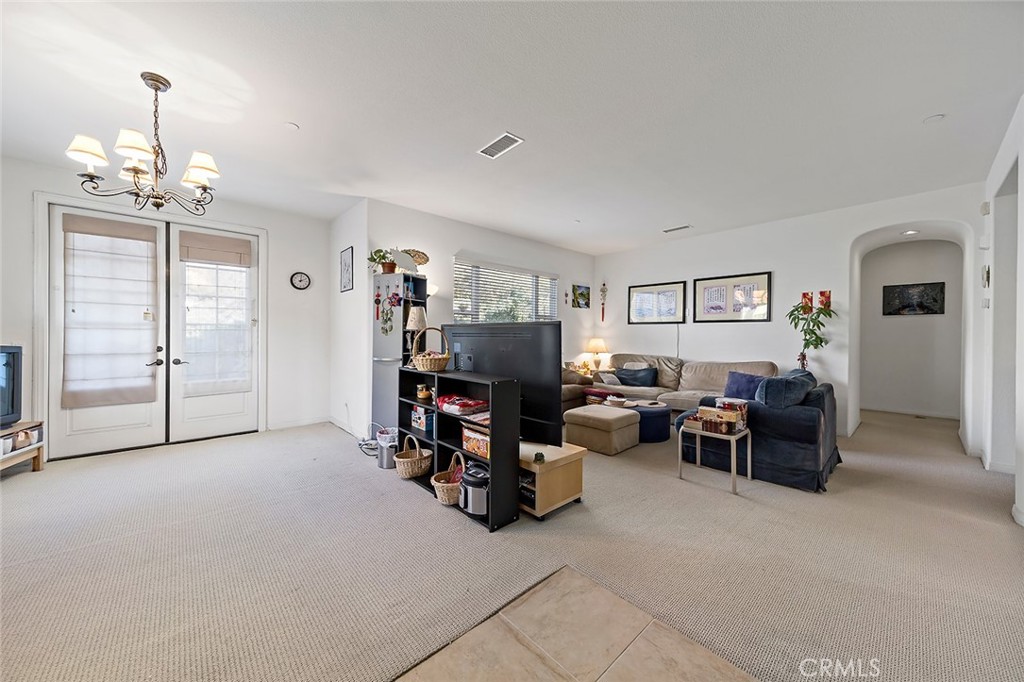 876 Sunset Place Diamond Bar, CA 91765 - Photo 5 of 17 a living room with furniture and a flat screen tv