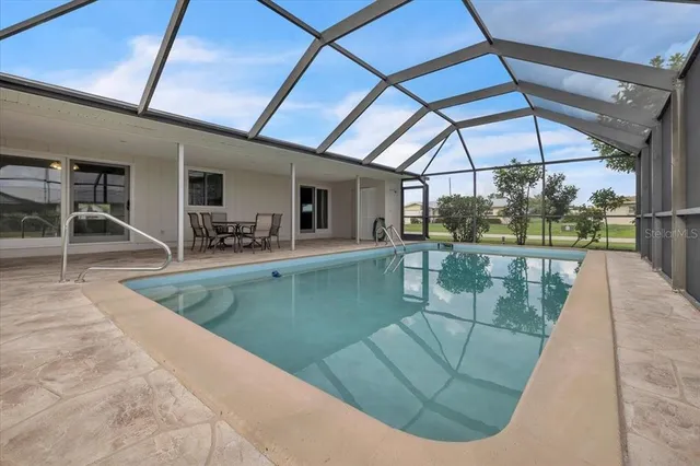 a view of outdoor space with swimming pool