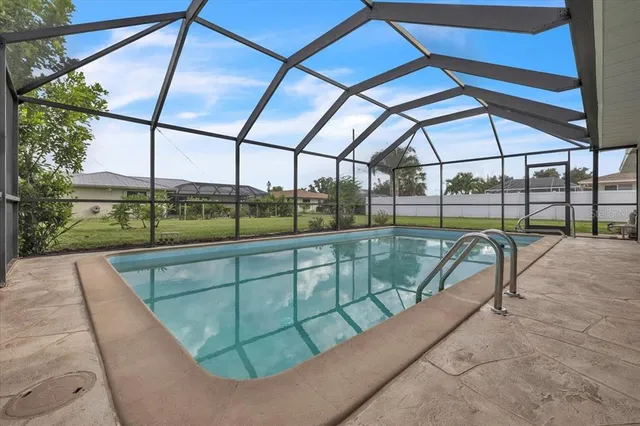 a view of outdoor space with swimming pool