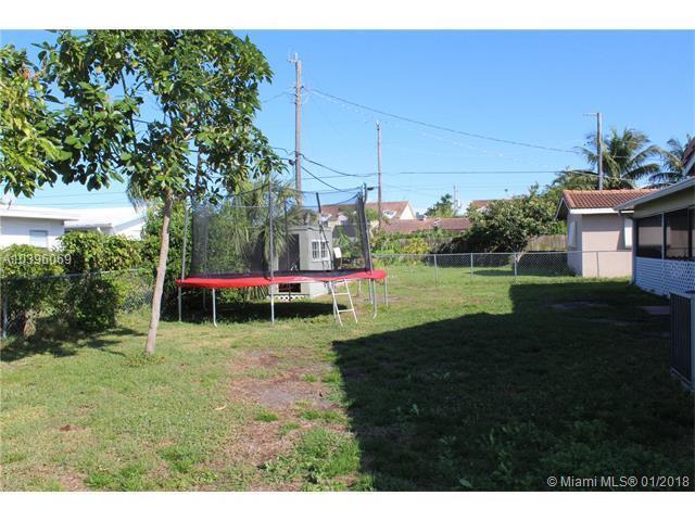 461 Northeast 42nd Street Boca Raton, FL 33431 - Photo 14 of 14 a childrens park with lots of green space and trees