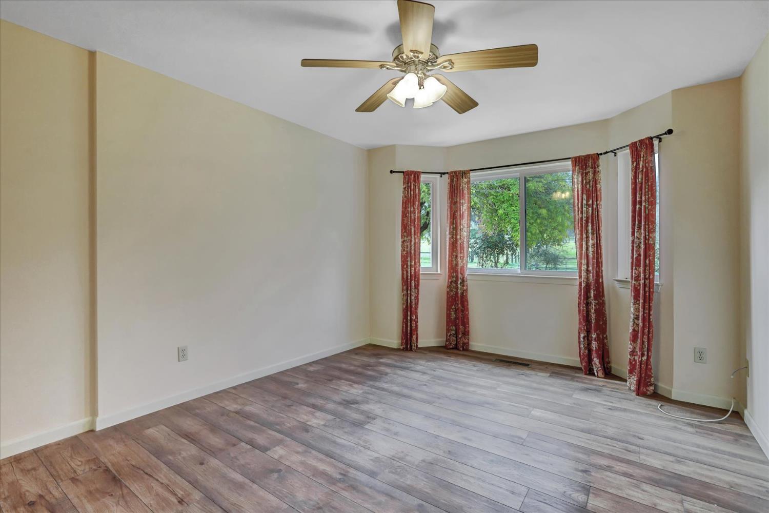19310 John Born Road Penn Valley, CA 95946 - Photo 16 of 78 a view of an empty room with a window