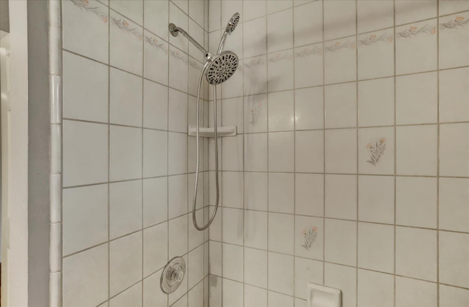 19310 John Born Road Penn Valley, CA 95946 - Photo 23 of 78 a bathroom with a shower