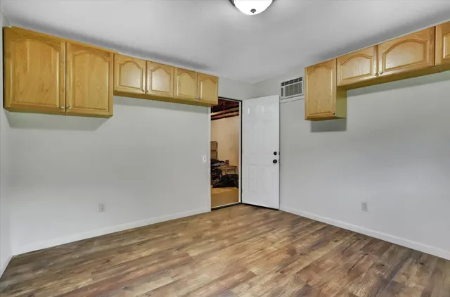 a view of a park with large trees