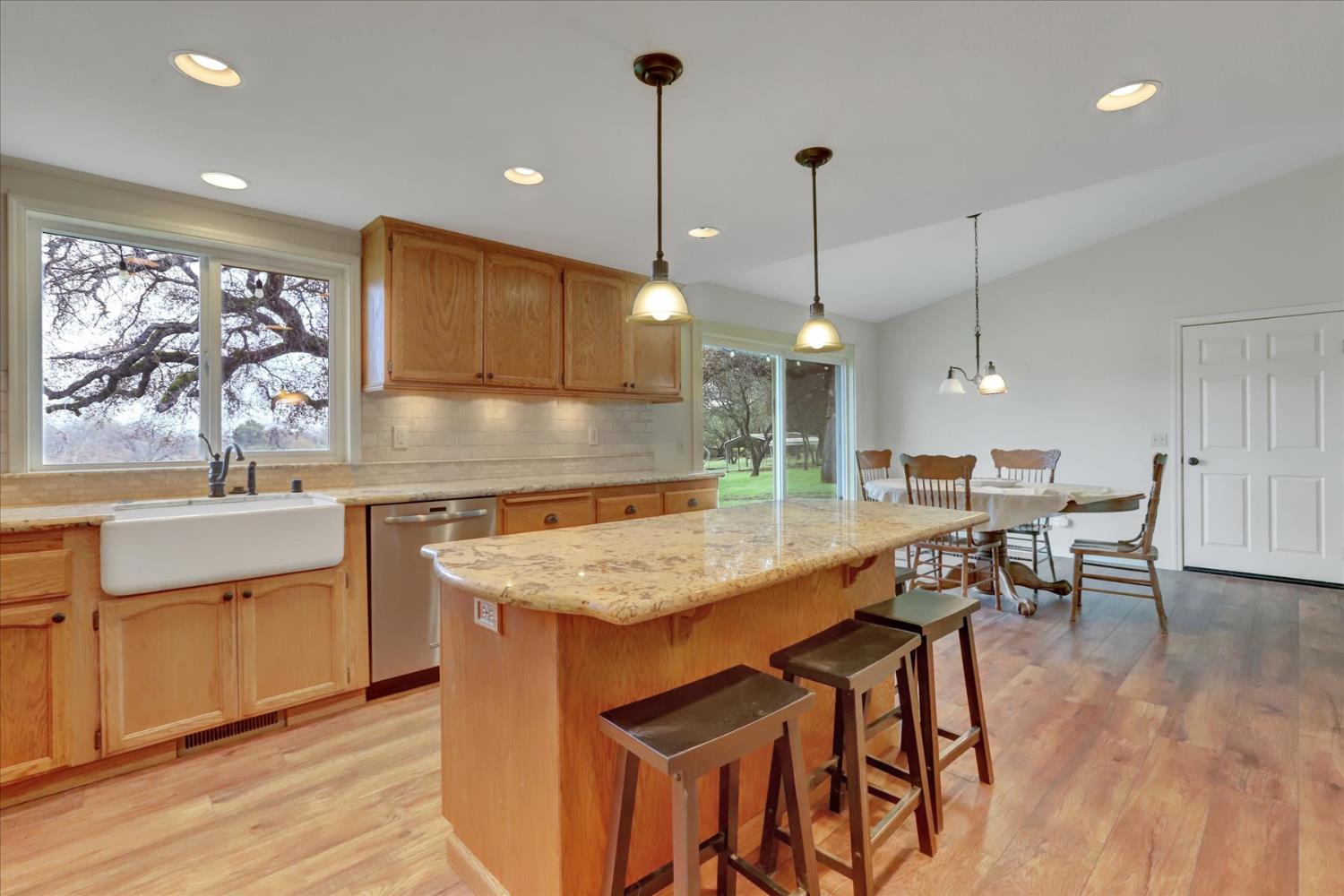 19310 John Born Road Penn Valley, CA 95946 - Photo 7 of 78 a kitchen with a table and chairs in it