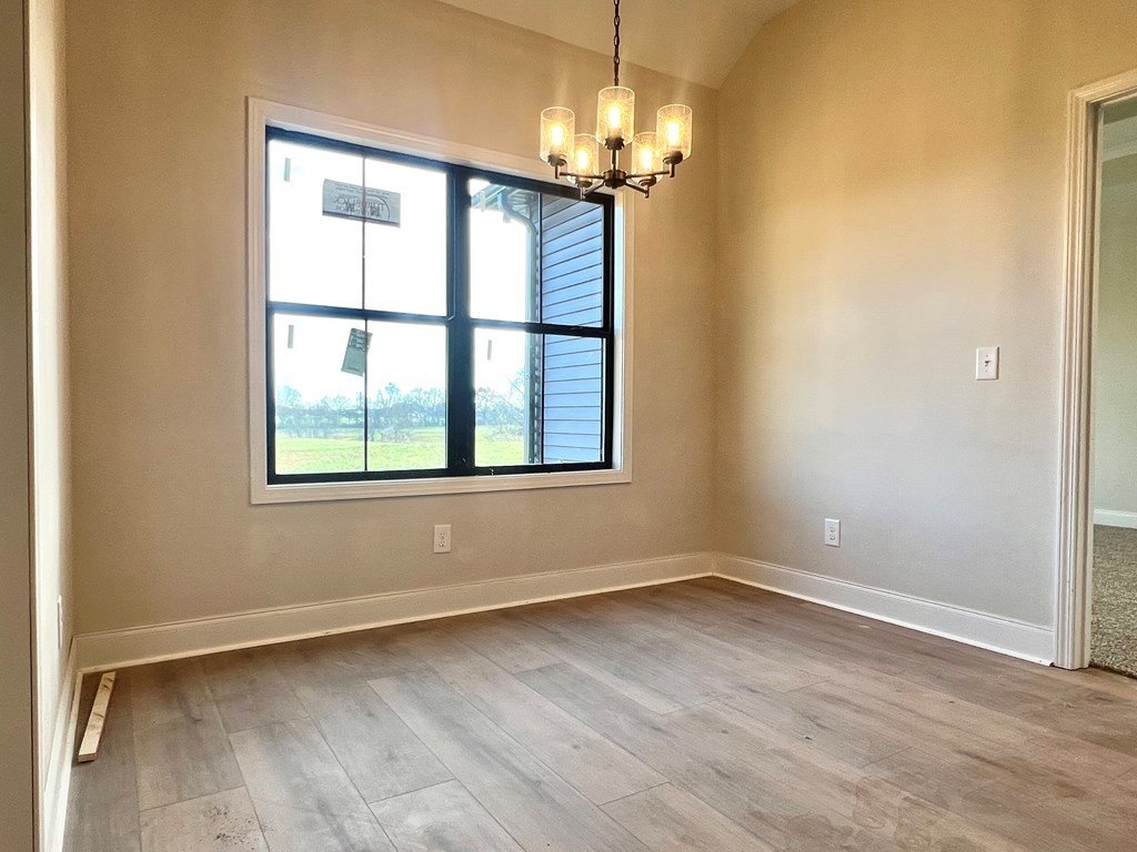 442 Old Major Road Hopkinsville, KY 42240 - Photo 11 of 29 a view of empty room with wooden floor and fan