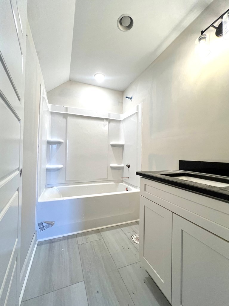 442 Old Major Road Hopkinsville, KY 42240 - Photo 21 of 29 a bathroom with a tub sink and mirror
