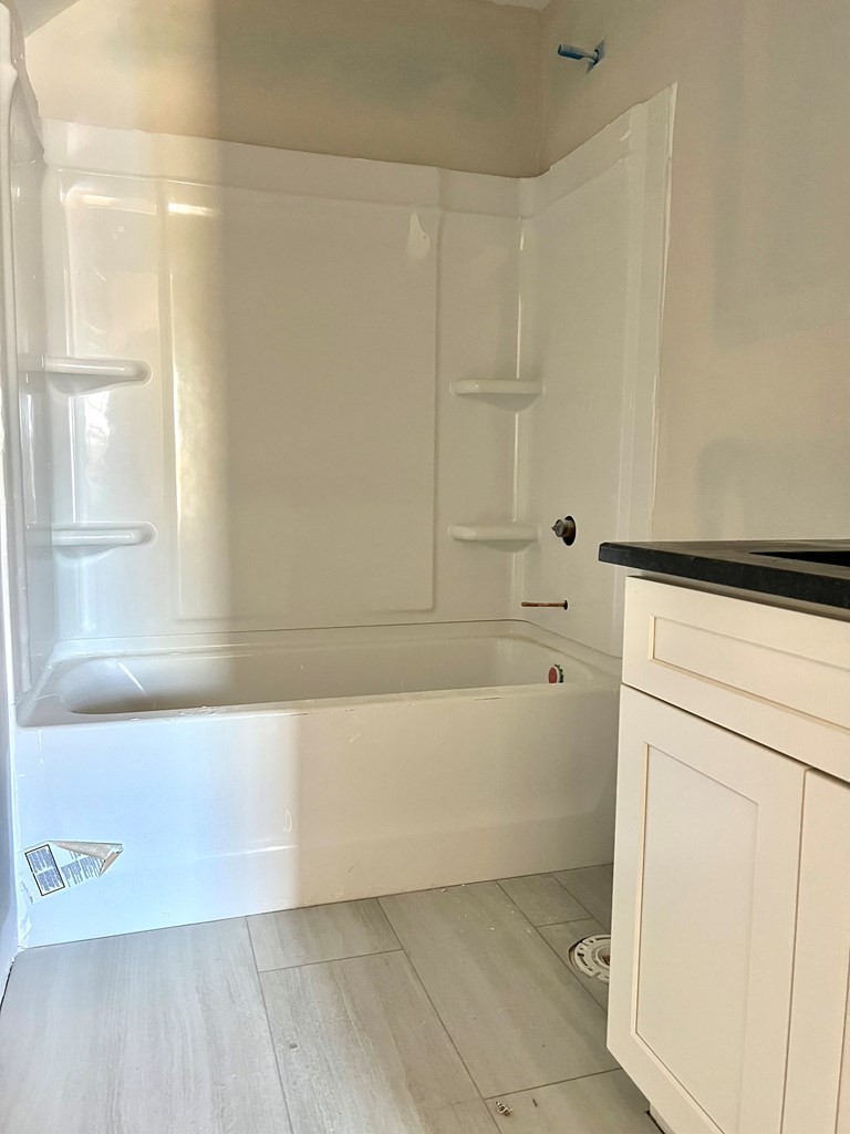 442 Old Major Road Hopkinsville, KY 42240 - Photo 26 of 29 a bathroom with a bathtub and a shower