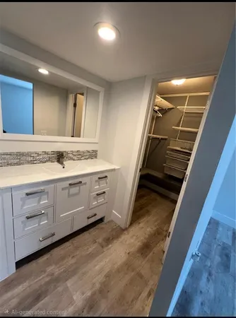 a view of room with cabinets