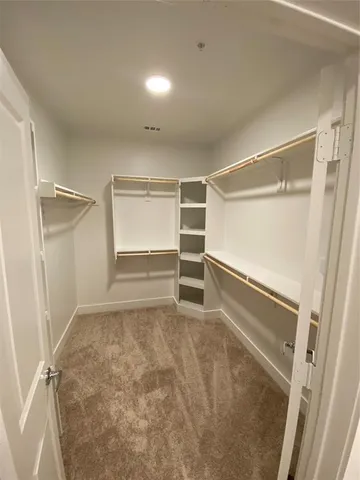 a room with walk in closet