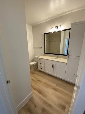 a view of a living room with a flat screen tv