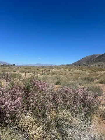 a view of mountain view with mountains in the background