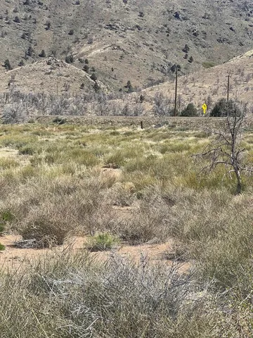 a view of beach and mountain