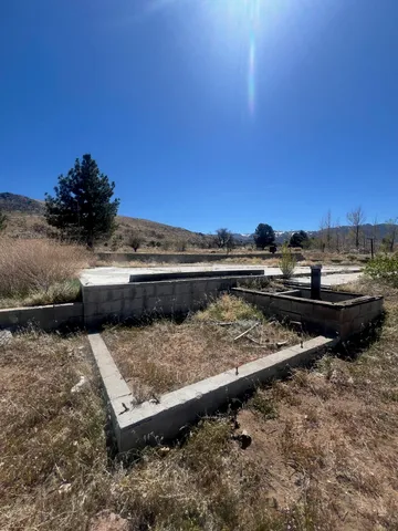 a view of a lake with a car parked