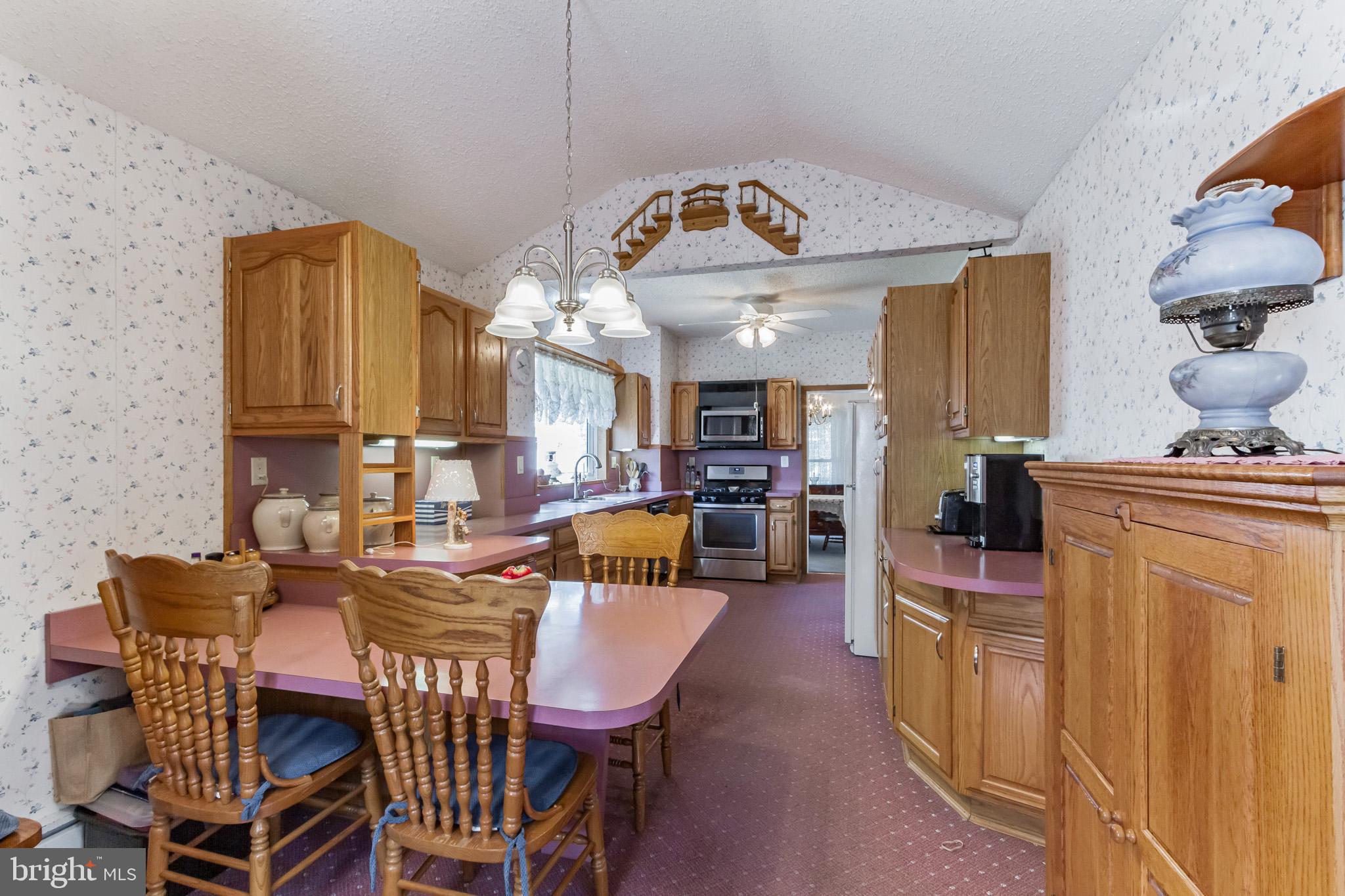 213 Garnet Street Carneys Point, NJ 08069 - Photo 11 of 39 a view of a dining room with furniture