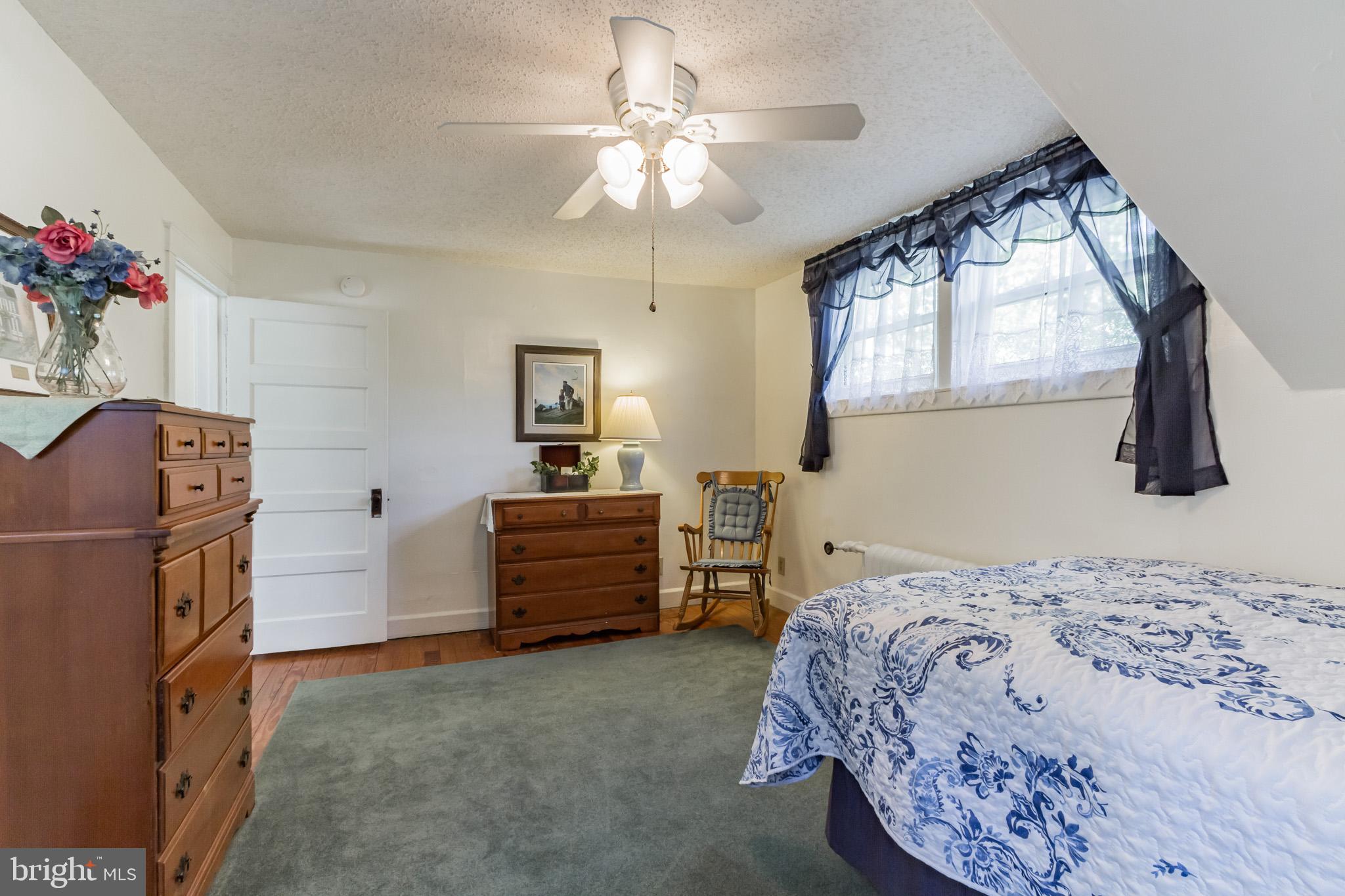 213 Garnet Street Carneys Point, NJ 08069 - Photo 16 of 39 a bedroom with a bed and furniture