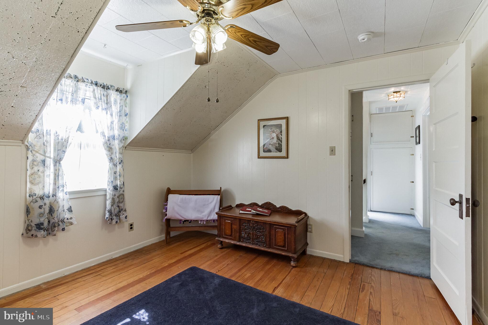 213 Garnet Street Carneys Point, NJ 08069 - Photo 18 of 39 a room with furniture and a window