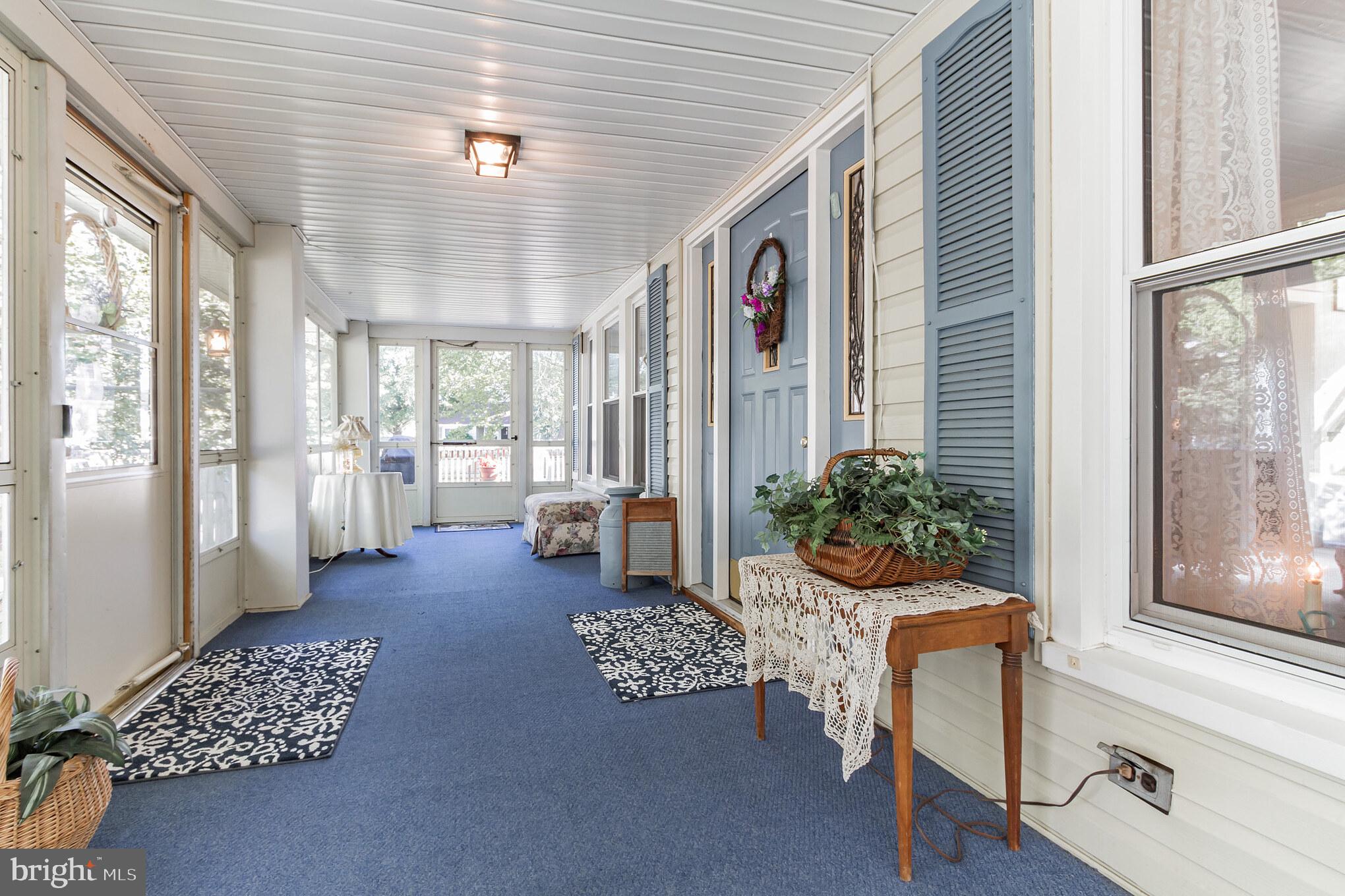 213 Garnet Street Carneys Point, NJ 08069 - Photo 26 of 39 a living room with furniture and a large window