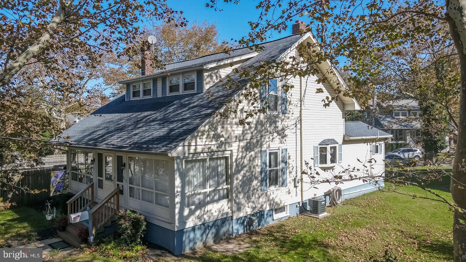 213 Garnet Street Carneys Point, NJ 08069 - Photo 28 of 39 a view of a house with a yard