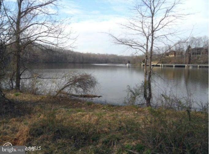 6718 Ridgecrest Road New Market, MD 21774 - Photo 1 of 1 a view of lake with green space