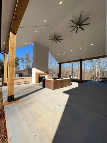 an aerial view of a house with outdoor space