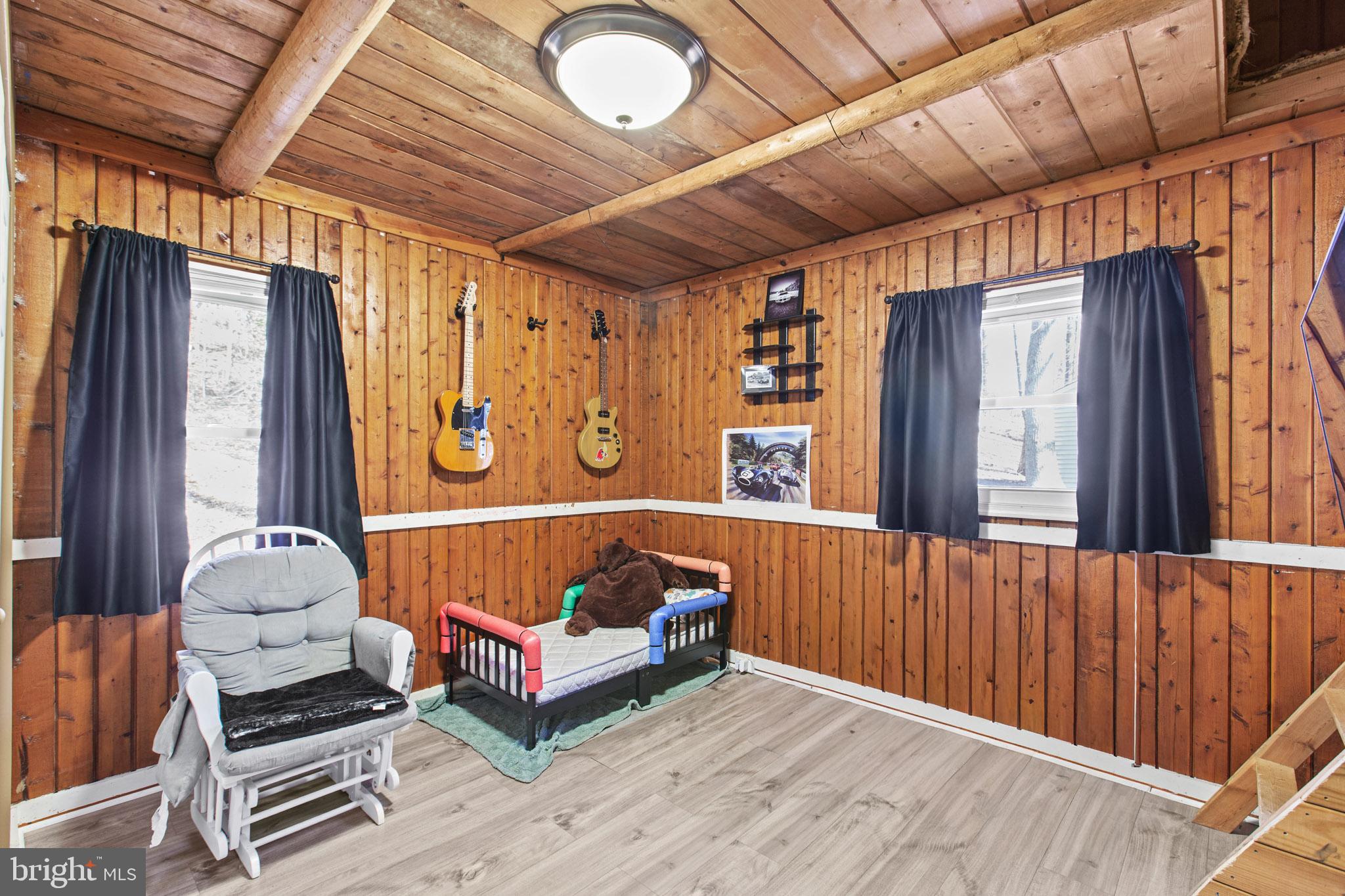 12646 High Sierra Road Lusby, MD 20657 - Photo 14 of 36 a living room with furniture and a window