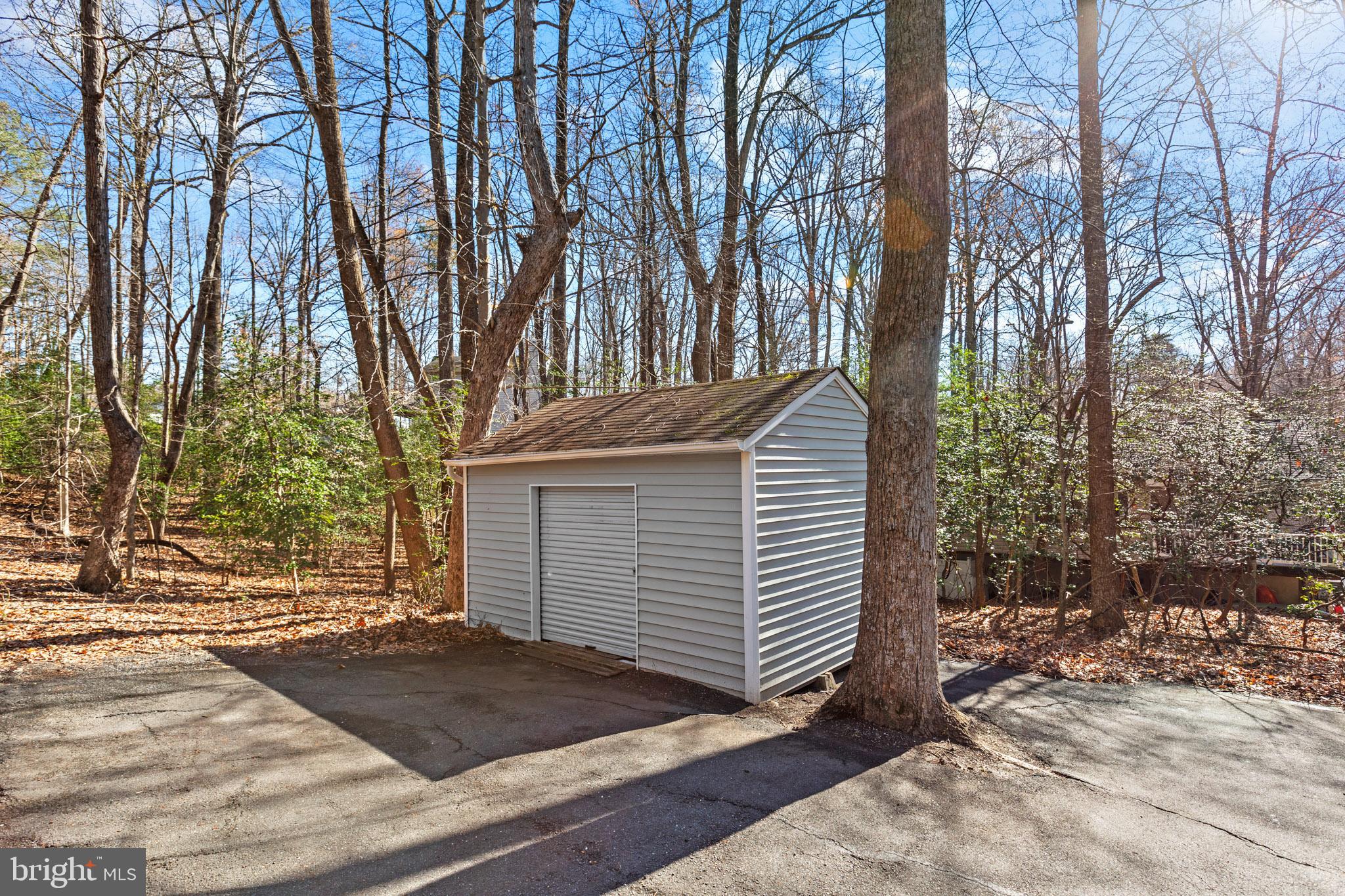 12646 High Sierra Road Lusby, MD 20657 - Photo 18 of 36 a view of a house with a yard