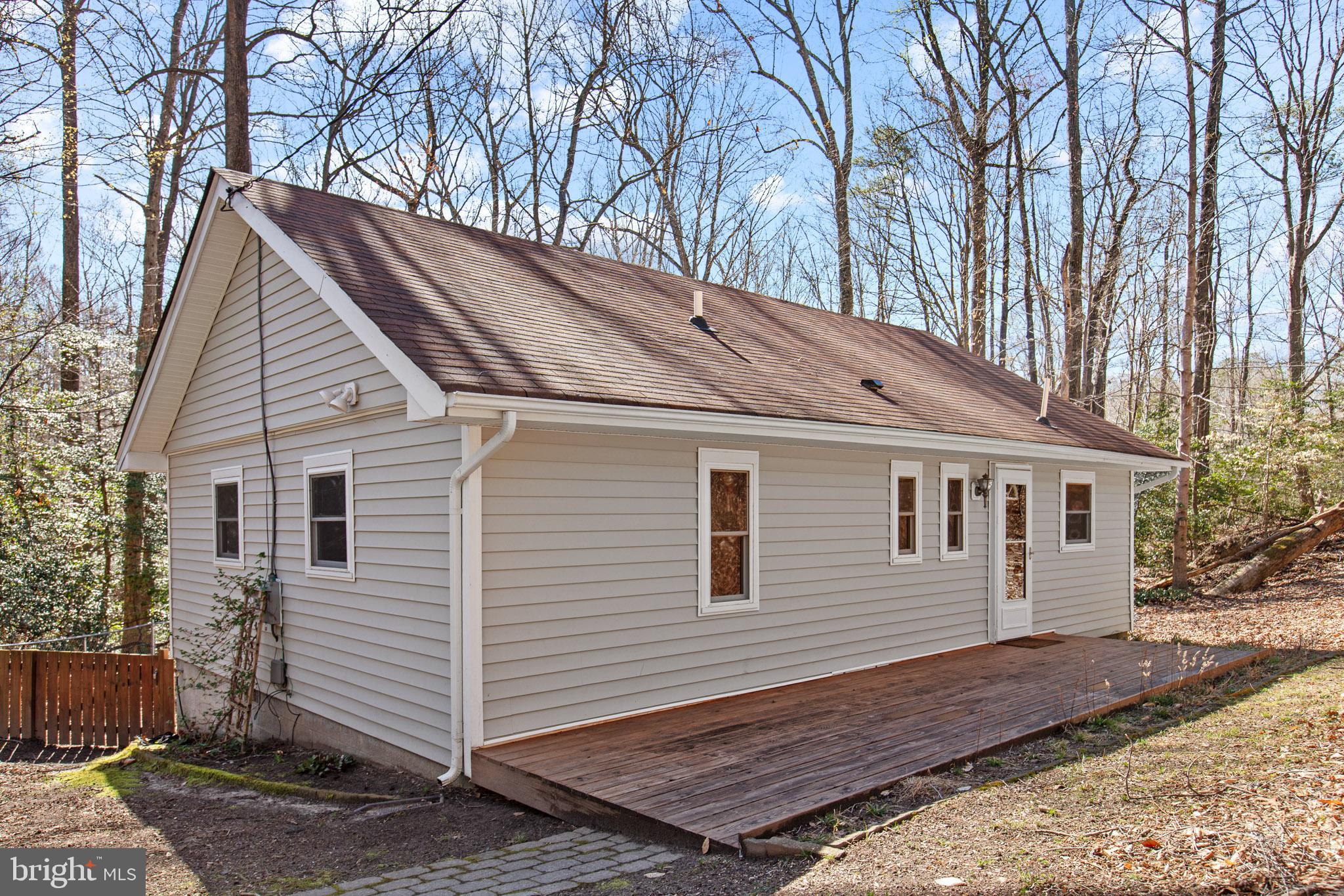 12646 High Sierra Road Lusby, MD 20657 - Photo 2 of 36 a view of a house with a yard