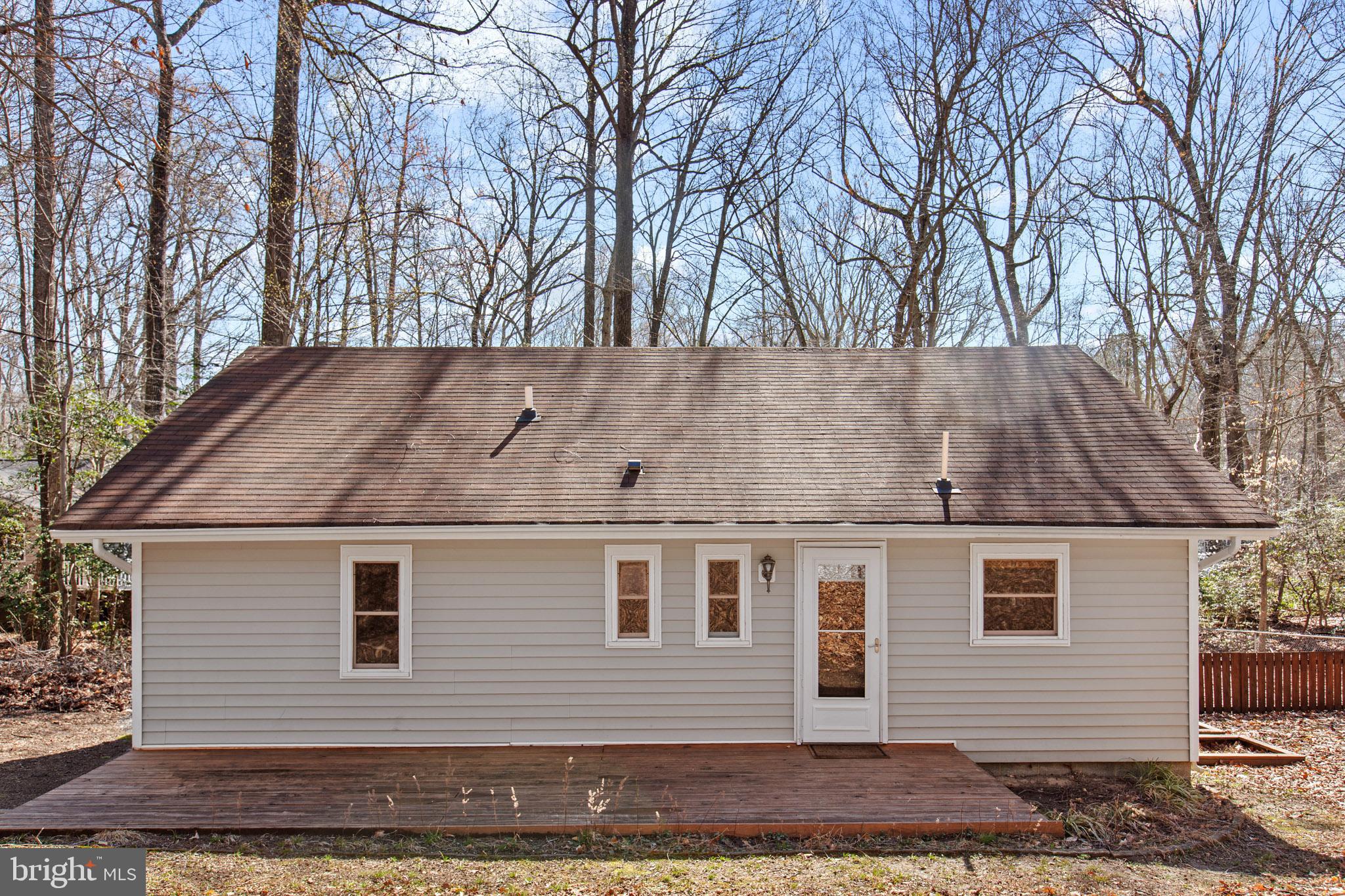 12646 High Sierra Road Lusby, MD 20657 - Photo 22 of 36 a view of backyard of house