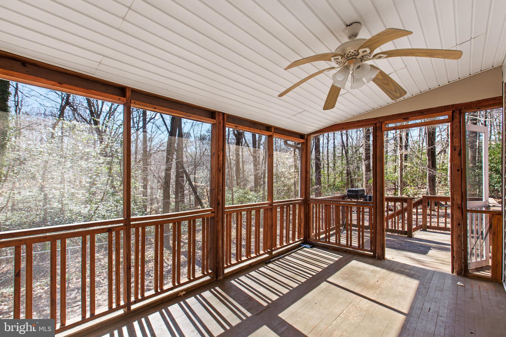 12646 High Sierra Road Lusby, MD 20657 - Photo 24 of 36 a view of a porch with wooden floor